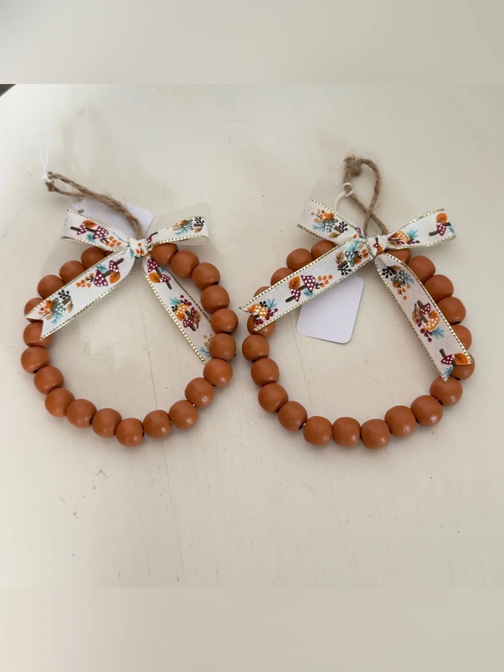 2 Handmade Wood Beaded Ornament With Mushroom Print Bow